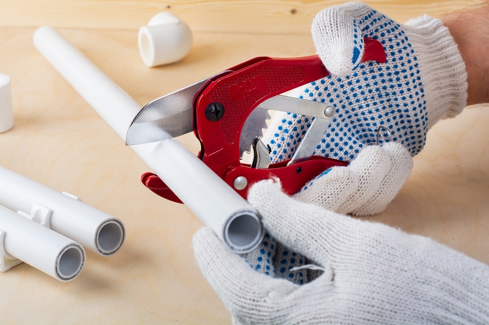 Pvc pipe cutting. concept of water supply