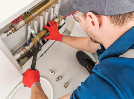 Technician Looking For Potential Issue in Plumbing